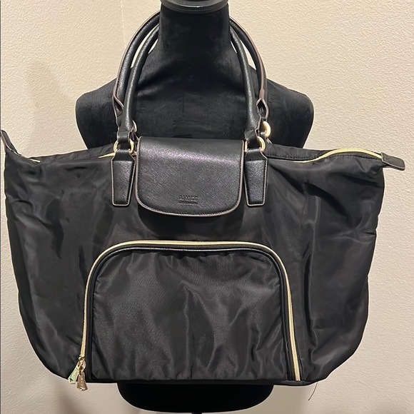 Florence Black Women's travel tote
By 
AIMEE KESTENBERG - Picture 1 of 4